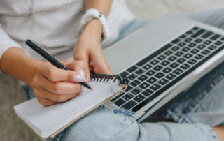 person studying with computer