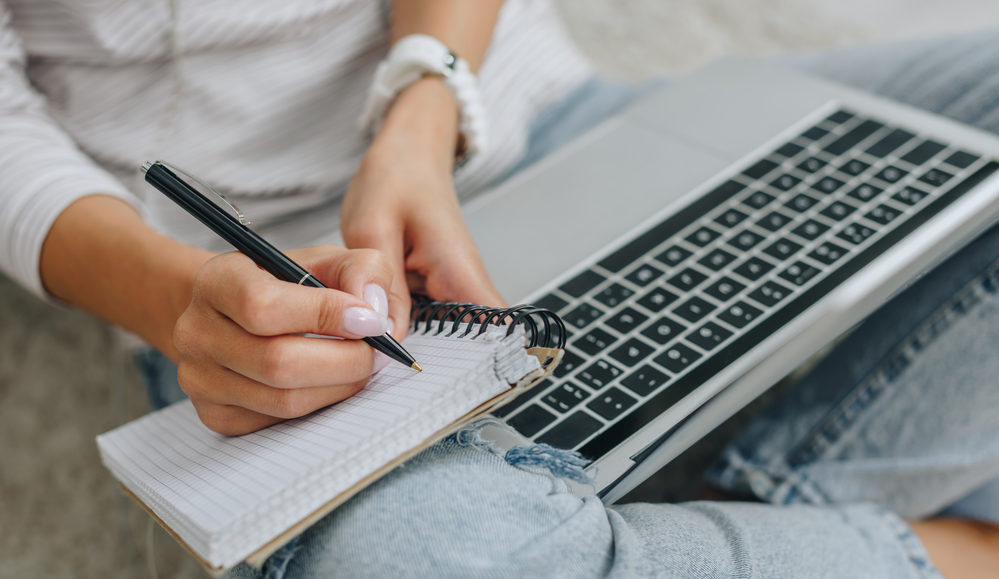 person studying with computer