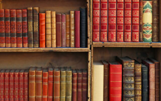 Medieval books in wooden bookcases