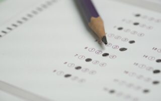 close up pencil bubbling answer sheets, test taking strategies