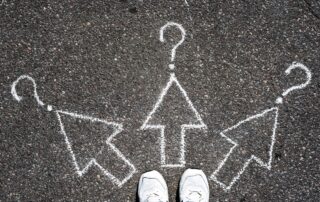 Arrows drawn in chalk on asphalt in front of your steps; students must make difficult choices (like in choosing a career).